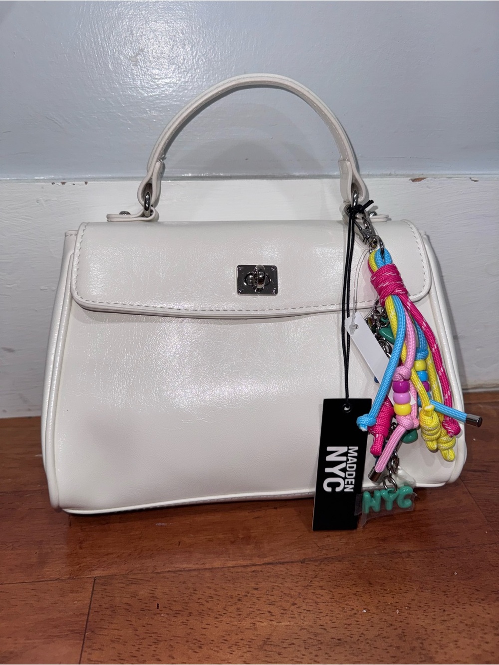 Madden NYC White Top-Handle Crossbody bag with Colorful Charm